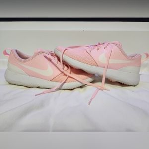 Pink Nike golf shoes